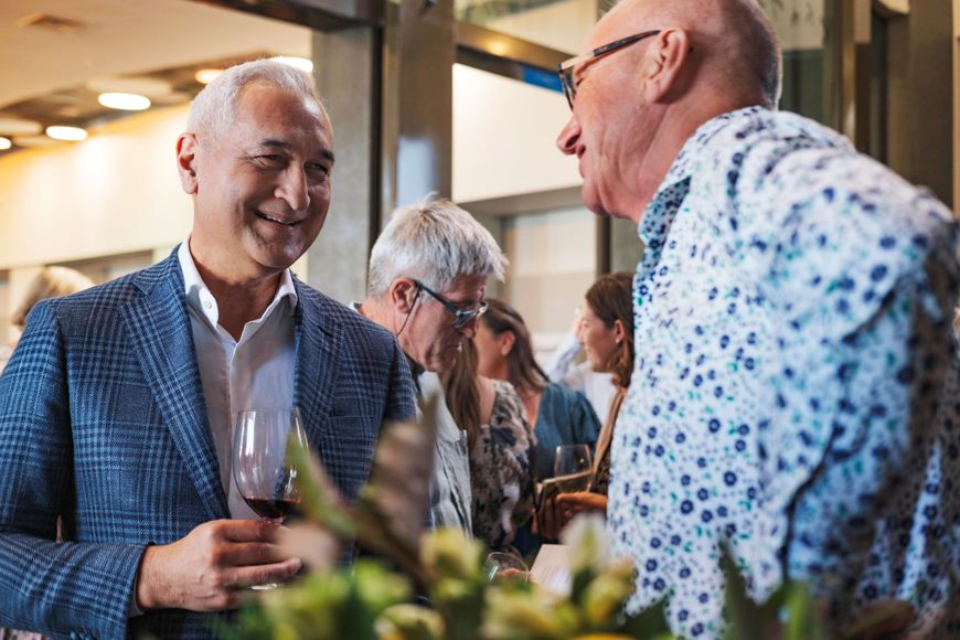 Hawke's Bay Wine Auction Event Ambassador, Mike McRoberts, enjoying the pre-auction tasting at the 2023 event
