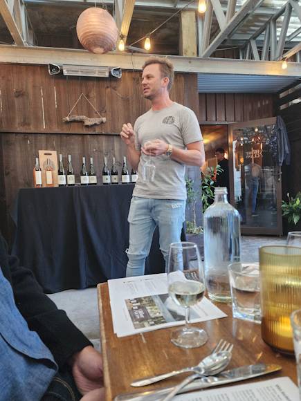 Dan Presenting Wet Jacket Wines 