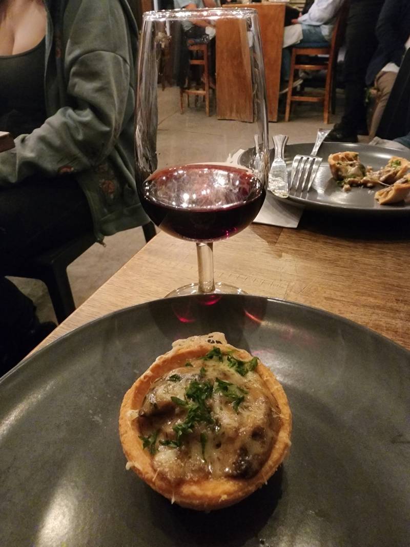 2024 Pinot Noir with Mushroom & Thyme Tartlets with gruyere, earthy, floral, spice. 